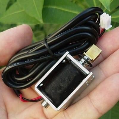 mini 12v dc electric cabinet door lock electromagnet push pull type in lahore islamabad karachi faislabad multan pakistan 1 b44fe91a 6e2f 45bd a358 d2bdb00659cb.jpg